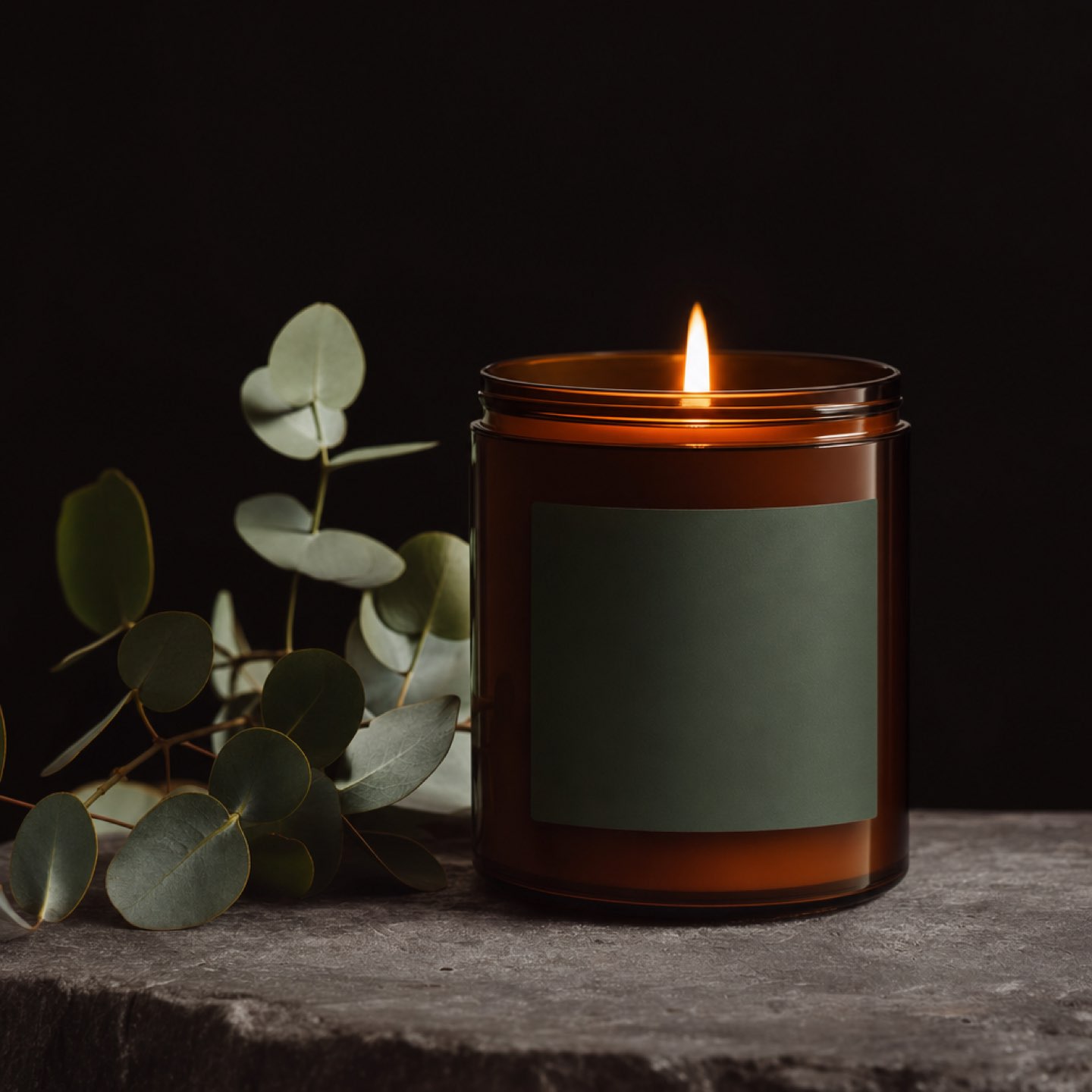 Dusk Hour Candle lit in an amber glass jar